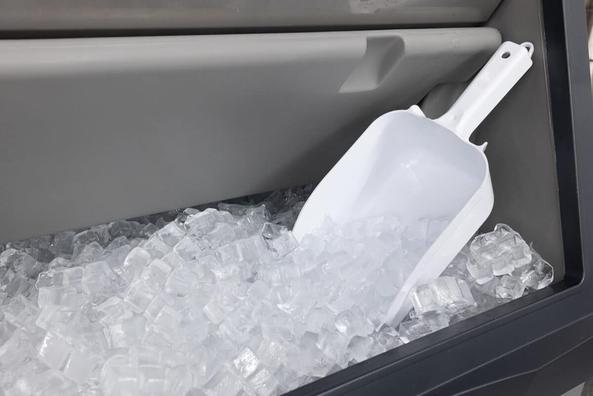 Keeping It Cool: How to Clean Your Commercial Ice Machine - B530P Ice in Bin MediumCube Scoop Environmental Angle2 - Eleven36 Blog