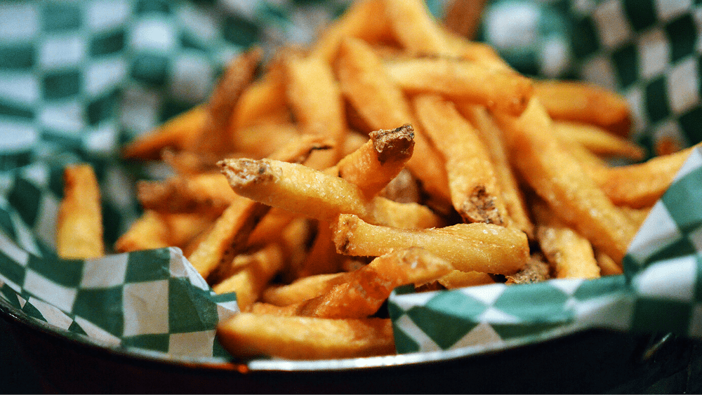 French Fries 101: What Commercial Equipment Do I Need? - Hand Cut Fries basket Pitco Canva min - Eleven36 Blog