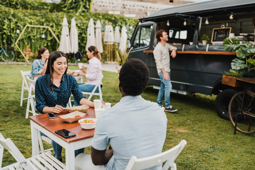 Guests dining at a food truck